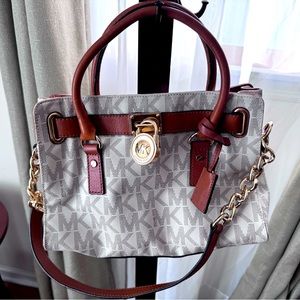 Barley used, amazing condition MK bag. Has strap and handle to be worn both